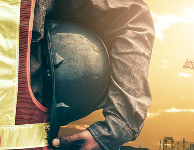 Worker following safety protocols around R&M Materials Handling equipment